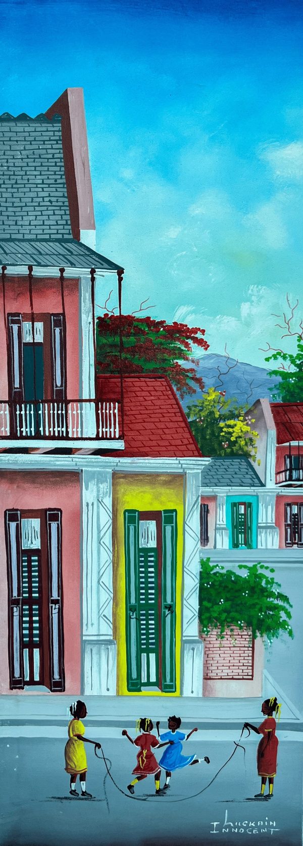 Sote Kòd de Luckner Innocent illustre l’innocence et la joie de l’enfance haïtienne. L’artiste capte l’énergie des enfants sautant à la corde, reflétant une scène de jeu traditionnelle pleine de vie et de spontanéité.